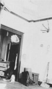 The urinal suspended in Marcel Duchamp's studio at 33 West 67th Street, New York, 1917-1918.