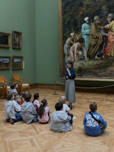 teacher with children in museum