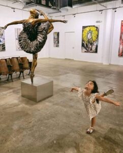 a child dancing in a amuseum